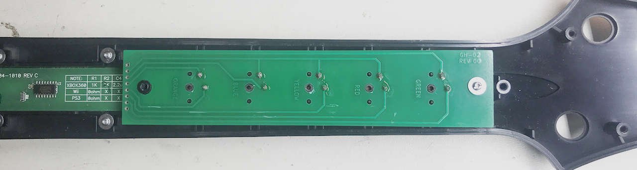 Board on Fret PC Board resting on the fret buttons